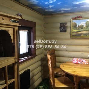 Внутренняя отделка бани из оцилиндрованного бревна Каменец