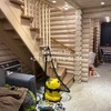 Конопатка сруба из оцилиндрованного бревна