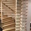 Конопатка сруба из оцилиндрованного бревна ракурс 3